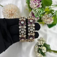 My 'Gulzar' openable bangles, shown here with red meenakari and floral kundan work.