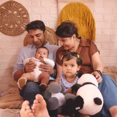 The whole family gathered together, sharing a smile and creating a memory that will last a lifetime.