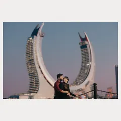 The futuristic architecture of Qatar provides a stunning, modern backdrop for a romantic pre-wedding night shoot. We capture love stories against diverse cityscapes.
