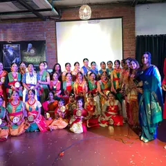 Our wonderful artists and teachers posing for a group photo after a successful event. Each student holds their well-deserved award.