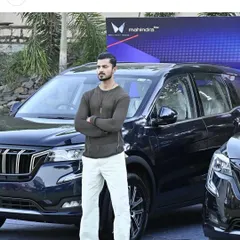Modeling for a collaboration with Mahindra XUV700 for Mysore Times Fashion Week. This shot combines automotive power with personal style.