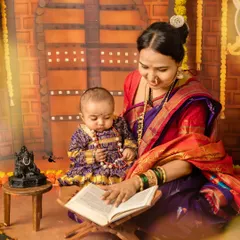 A beautiful moment between mother and child during our Shivaji Maharaj Jayanti session. Here, she reads stories of bravery to her little 'Shivba'.