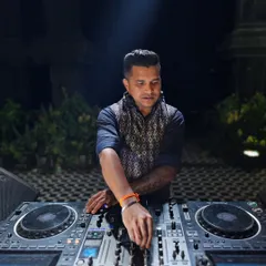 A close-up of me at my Pioneer DJ console. I use industry-standard equipment to ensure the highest quality sound and a professional performance.