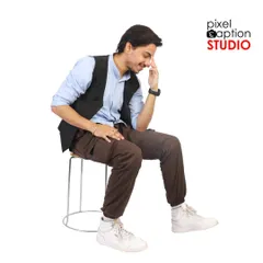 A candid, seated pose that adds personality and range to a model's portfolio.