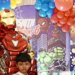 Make your child's party unforgettable with a visit from their favorite superhero. I arrange for professional character artists, like Iron Man here, to interact with the kids, pose for photos, and bring the theme to life.