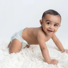 The classic crawling pose, full of excitement and energy.