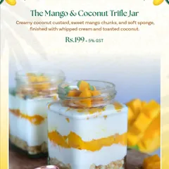 Another star from my Mango Menu, the Mango & Coconut Trifle Jar. This dessert features layers of creamy coconut custard, sweet mango chunks, and soft sponge, finished with whipped cream and toasted coconut.