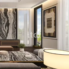 Here, the bold, book-matched stone wall serves as the room's artistic anchor, allowing the rest of the palette to remain restrained. We believe good design is not about adding more, but about letting the right elements hold the space with confidence and quiet authority.