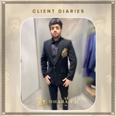 This client chose a modern black suit with an asymmetrical design and a gold embroidered motif. It’s a unique piece that perfectly reflects his personal style.