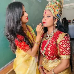 Working on a performer for a Navratri festival. I ensure the makeup not only looks great up close but also makes an impact from the audience, coordinating with her beautiful kireetam and costume.