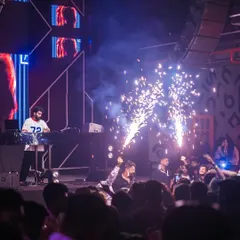 I believe in a full sensory experience. My shows include a complete audio-visual setup with special effects like these cold pyro sparklers to make the key moments unforgettable. It’s all about creating that 'wow' factor.