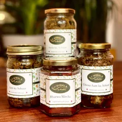 A beautiful family of my best-selling pickles, ready to find a new home. You can see my Amla ka Achaar, Ghissu Aam ka Achaar, classic Aam ka Achaar, and the fiery Bharwa Mirchi. Each one is made in small batches to ensure freshness.