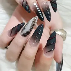Another view of the highly detailed and textured avant-garde nail set, showcasing our ability to create unique, high-fashion looks.
