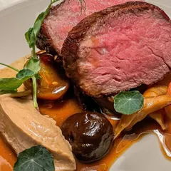 A perfectly seared fillet steak, served with a rich port sauce, mushroom ketchup, and rehydrated tomatoes for a modern take on a classic.