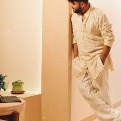 Another shot from the SoMan Menswear campaign. The relaxed fit and intricate detailing make it a standout piece for any modern man's wardrobe.