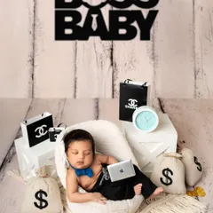 Here is another take on the popular "Boss Baby" theme. Complete with money bags and luxury-themed props, this setup is all about fun and personality for your little one.