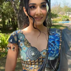 This close up shows the soft glam created for an outdoor event. I used a gentle smokey eye and a glossy nude lip, paired with a relaxed hairstyle, to craft a look that is both elegant and perfect for a daytime celebration.