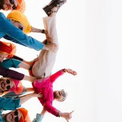 The groomsmen in their element. This playful and energetic shot of the groom being lifted by his friends is a perfect memory of the fun and camaraderie of the day.