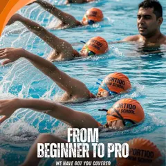 Our structured programs guide swimmers from their very first strokes to professional-level competition. Here, our coach works on form and technique with a squad dedicated to improvement.