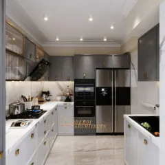 The U-shaped layout of this kitchen ensures an efficient workflow, with everything within easy reach. The gold-finished handles add a touch of luxury.