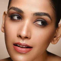 Part of my 'Kaia' portrait series, this shot highlights the eyes. The soft lighting and clean retouching focus on the detailed makeup application, making it a strong image for a cosmetic brand's portfolio.
