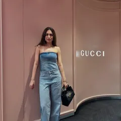 A full-length shot of the denim outfit, showing how the two different washes of denim work together.