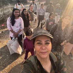 The whole group, including kids, ready for a morning of birding and cleaning. Our events are a great way for families to spend quality time in nature.