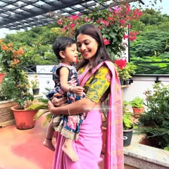 A perfect example of a 'Mommy and Me' concept. I used the vibrant floral fabric from the mother's blouse to create a matching dress for her daughter. It's these little details that create a special connection and make for beautiful photos.