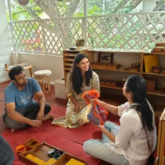 The joy of shared discovery and connection between parents in our workshop space. These moments of conversation and laughter are just as important as the hands on work, building a true community of support.