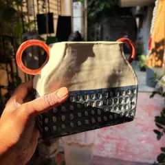 This student completed both her beginner and advanced courses with us. For her advanced work, she found her rhythm with the Nerikomi technique, creating this beautiful and calm set of patterned plates and bowls.
