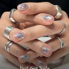 This is what I call Next-Gen Nails. Featuring a clear base with futuristic silver chrome details, this manicure is for the modern man who isn't afraid to experiment with creative and artistic nail designs.