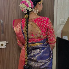 It's all in the details. This traditional South Indian bridal braid, complete with fresh flowers and intricate gold accessories, is a masterpiece in itself and a core part of the complete bridal look I provide.