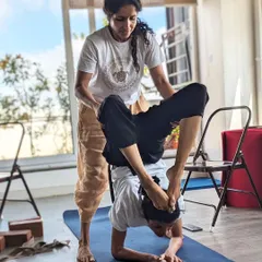 The Guru-Shishya (teacher-student) relationship is sacred. Here, we provide hands-on guidance to help a student safely explore Vrischikasana (Scorpion Pose). Our small class sizes ensure you receive the personal attention needed to grow in your practice with confidence and correct alignment.