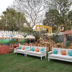 Another view of the lively Mehendi event, showing the different activity zones we created. You can see the dedicated photo booth area and guest seating, all designed to create a fun, interactive, and memorable experience.