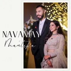 A classic, elegant portrait of the newly engaged couple. This shot, taken at the Gymkhana Club Delhi, captures their sophisticated style against a backdrop of beautiful bokeh lights.