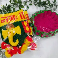 A happy customer's order packed and ready for Diwali. This includes my bestselling Ganpati toran and a pink lotus aasan.