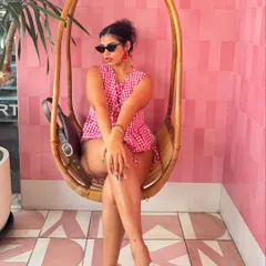 I have a serious obsession with gingham. This red and white gingham co-ord set is so fun and playful, perfect for a summer vacation. I paired it with quirky watermelon earrings to really lean into the fun vibe.