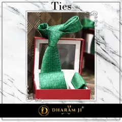 A beautiful green patterned tie and pocket square set, presented in a gift box. These accessories make a perfect gift or a great addition to your own wardrobe.