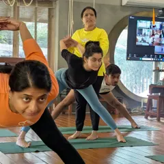 A class in session, with students of all levels working together. The collective focus and energy create a powerful environment for growth.
