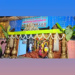 A temple entrance decorated for a festival. We teach our students how to work on live sites and handle the unique requirements of temple decorations.