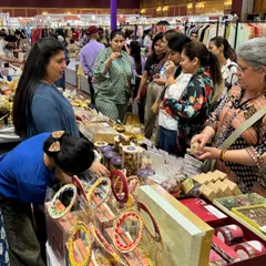 The best part of any exhibition is interacting with customers. Here I am at the Jalsa exhibition, offering tastings and talking to visitors about my dips, salads, and mithai. The energy was amazing.