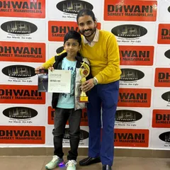 Our national winner, Abhinav Roy, with his proud teacher. This achievement in a major piano competition reflects the high standard of training and the strong Guru-Shishya bond at Dhwani.