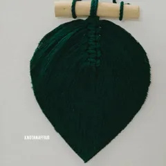 A pretty macrame leaf in a rich bottle green. This was part of a bulk order where the client planned to stitch them onto a curtain. They also look great as individual wall hangings.
