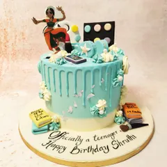 Our Teenager Cake is a personalized story, featuring a love for dance, books, and makeup, all captured in detailed fondant and edible prints.