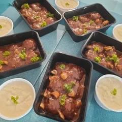 This is my Salisbury Steak, a classic comfort dish. I make juicy meat patties and simmer them in a delicious mushroom sauce, served alongside a generous portion of creamy mashed potatoes.