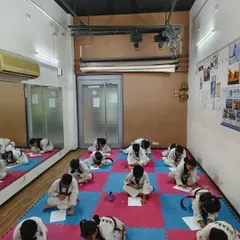 Students are focused during their written examination for belt promotion. I believe a true martial artist must understand the 'why' behind the 'how', and this test ensures they do.