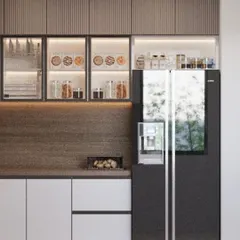 This kitchen is for those who love their culinary space as curated as their wardrobe. It features sleek, dual-toned cabinetry with glass-fronted sections and a smart refrigerator, combining elegant display with practical storage.