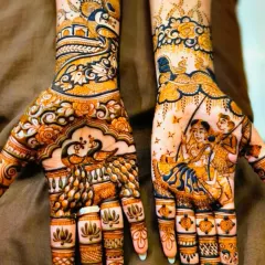 This vibrant Teej design features Radha and Krishna on a swing, surrounded by peacocks and floral patterns. The color is exceptionally rich thanks to my organic henna.