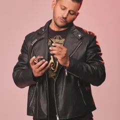 A shot from my 2025 photoshoot. Holding my Sennheiser headphones, I am always connected to the music, whether in the studio or on stage.