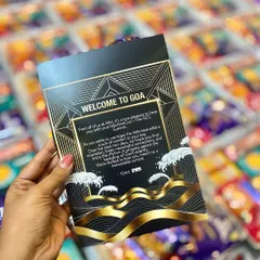 Another example of a beautifully designed custom welcome card, this one for the Machine Con summit in Goa, tying the gift to the event's identity.